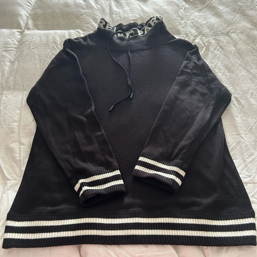 Black sweater with White Stripes